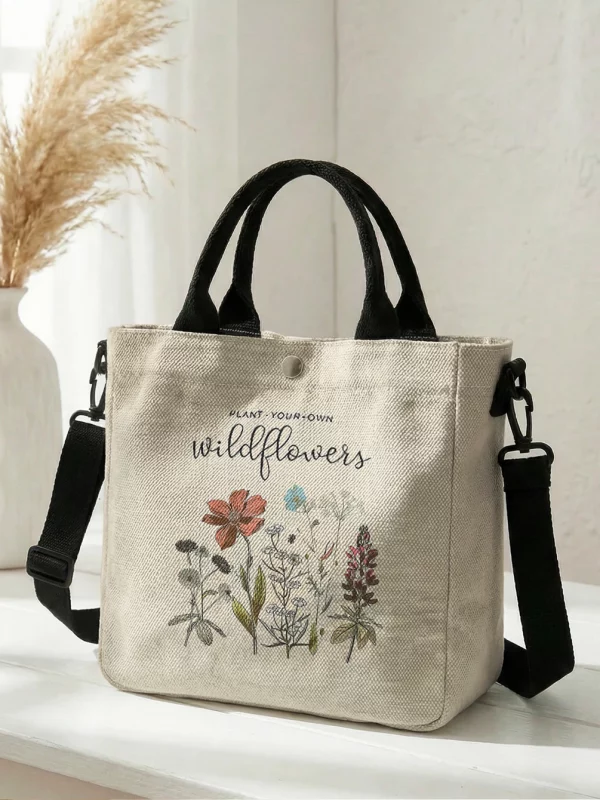 S3374bb1331a640739504cd7b728115b8b.webp Sac fourre-tout en toile à motif floral « Plant Yo