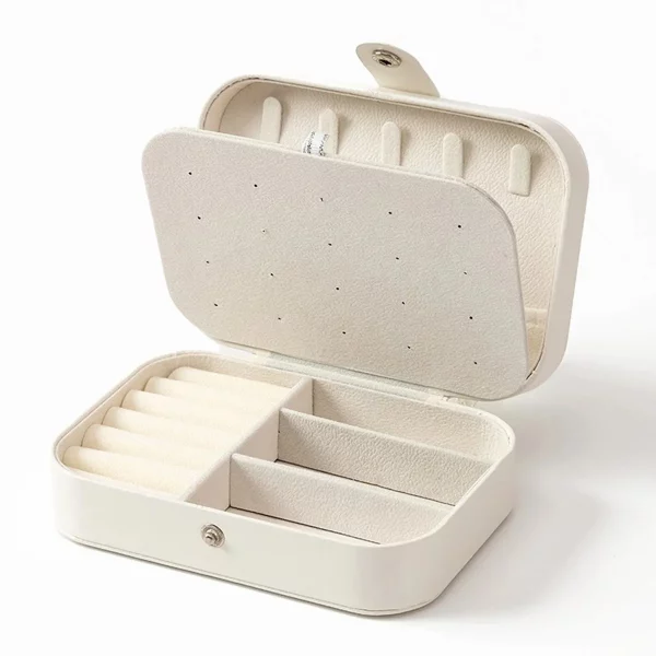 Boîte à bijoux portable mini en cuir PU, doublée d