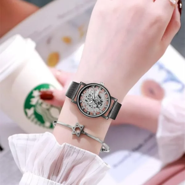 Sabc86d2f596f435ea2eaab80bbb26df6f.webp Haut tendance femmes squelette creux Faux montre m