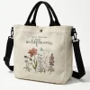 Sb4d58fb7211f4d09bd39a1e054eaeba8m.webp Sac fourre-tout en toile à motif floral « Plant Yo